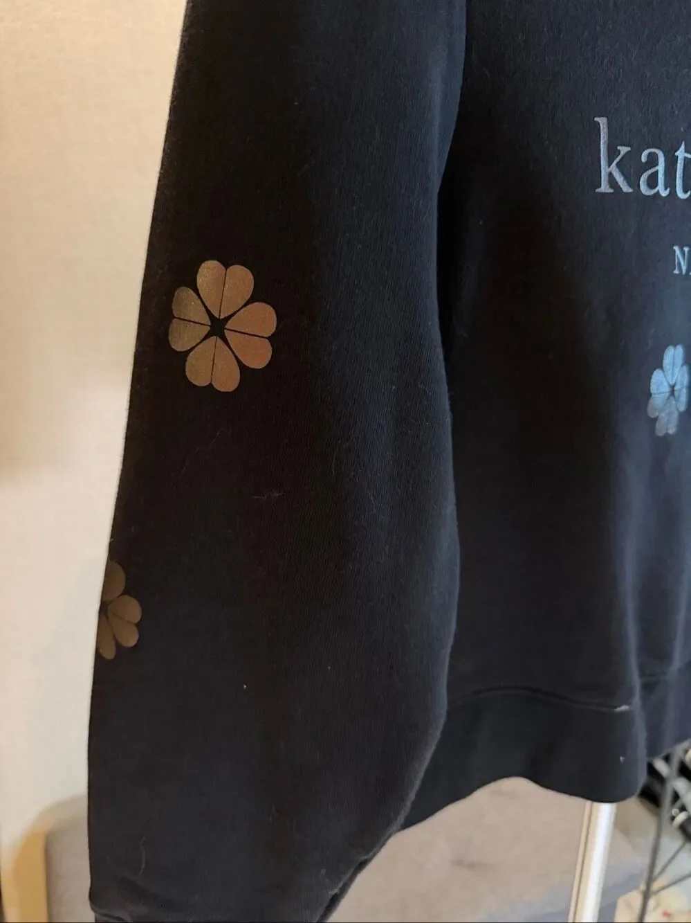 Kate Spade, New York flower sweatshirt, black with metallic silver flowers in si